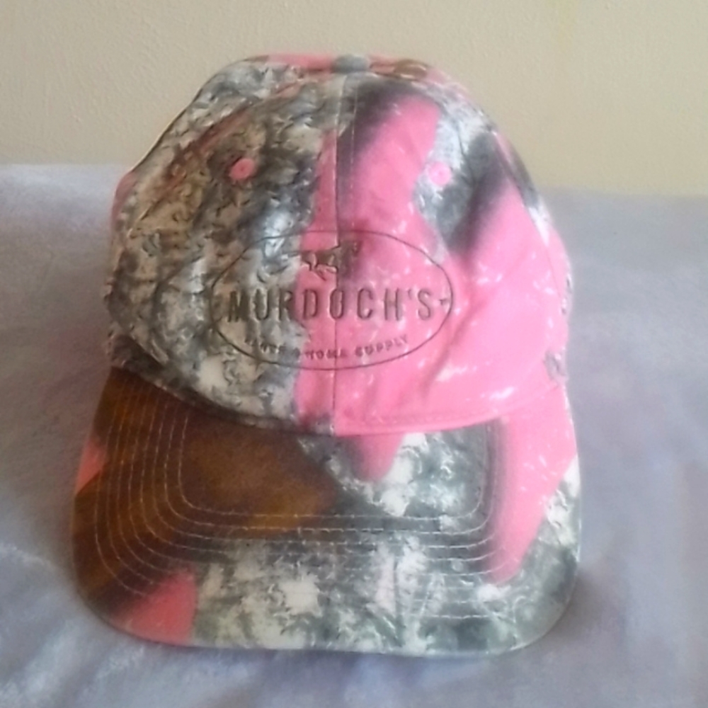 Murdoch's pink camo baseball cap